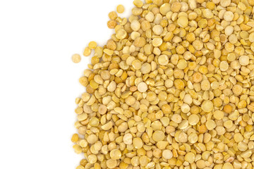 Yellow split peas isolated on white background