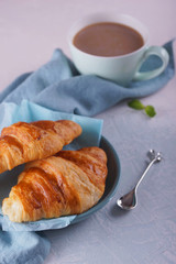 Breakfast with fresh croissants.