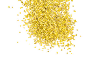 Yellow millet groats isolated on white background