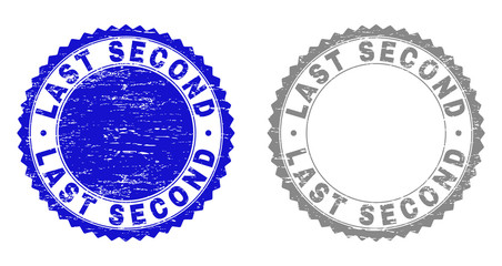 Grunge LAST SECOND stamps isolated on a white background. Rosette seals with grunge texture in blue and gray colors. Vector rubber stamp imprint of LAST SECOND caption inside round rosette.