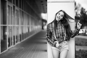 Girl in a clown makeup black and white