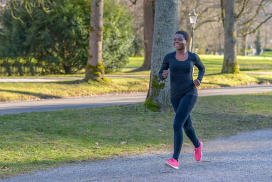 Smiling healthy happy fit young African woman
