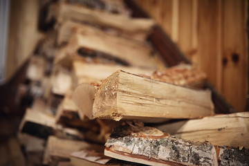 Wood burning stove. Firewood for furnace heating. Warehouse for firewood for the stove.