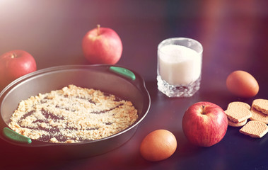 Preparation of apple pie at home. Homemade pastries with apples and nuts. Sweet dessert from apples baked.