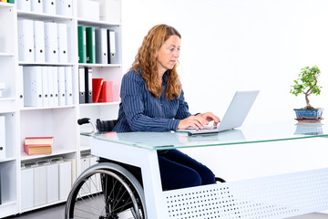disabled businesswoman in wheelchair