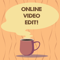 Text sign showing Online Video Edit. Conceptual photo taking away clips of that video that are not necessary Mug photo Cup of Hot Coffee with Blank Color Speech Bubble as Steam icon