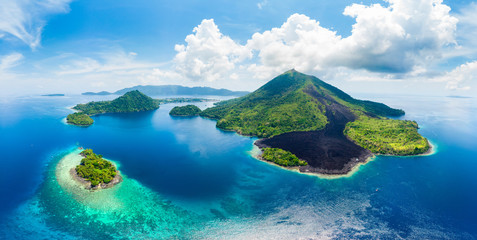Aerial view Banda Islands Moluccas archipelago Indonesia, Pulau Gunung Api, lava flows, coral reef white sand beach. Top travel tourist destination, best diving snorkeling. - obrazy, fototapety, plakaty