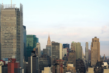Fototapeta na wymiar Aerial and panorama view of skyscrapers of New York City, Manhattan. Top view of night midtown of Manhattan.