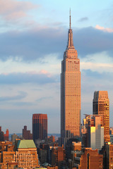 Fototapeta na wymiar Empire State Building with New York City Manhattan skyline and skyscrapers at dusk.