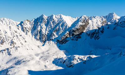 Fototapeta premium Mountains in a winter scenery. Natural landscape of the High Tatras.