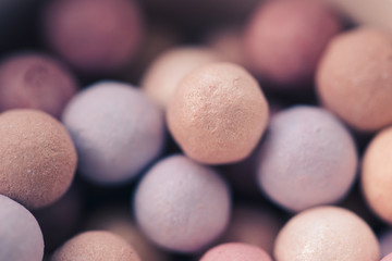 Colorful powdwe balls closeup. Selective focus.