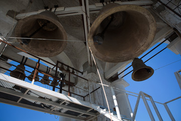 Bottom view of the Church bells. Close-up view of metal orthodox church bells.