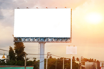 blank white billboard at sunset - can advertisement for display or montage text free space product and business.