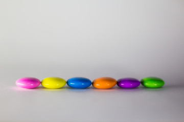 Gems chocolate candy with white background 