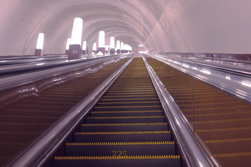 Moving up the escalator in the subway.