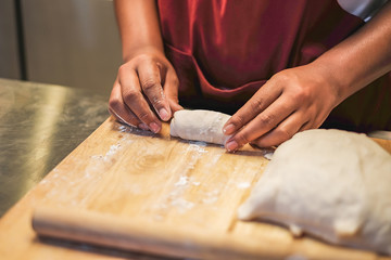 Cooks cooking in Chinese kitchen