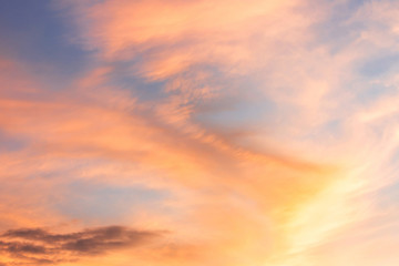 Naklejka na ściany i meble orange and blue sky background in the evening or dusk