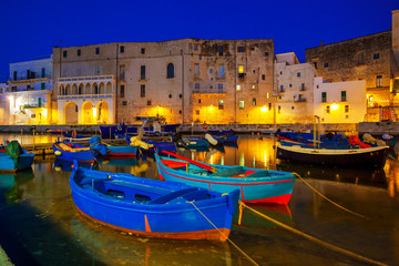 Old port of Monopoli province of Bari, region of Apulia, southern Italy. Boats in the marina of...