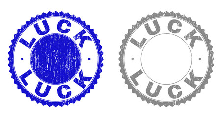 Grunge LUCK stamp seals isolated on a white background. Rosette seals with grunge texture in blue and grey colors. Vector rubber overlay of LUCK text inside round rosette.