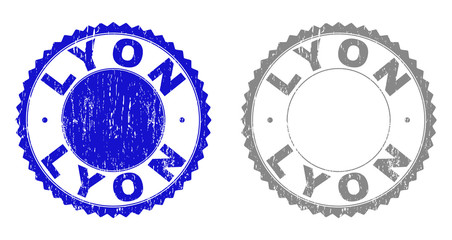 Grunge LYON stamp seals isolated on a white background. Rosette seals with distress texture in blue and grey colors. Vector rubber stamp imitation of LYON label inside round rosette.