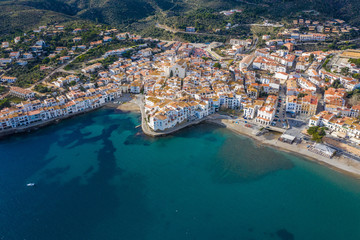 Blue sea and Cadaques city. Spain Catalonia. Aerial view photo. Sunny day.