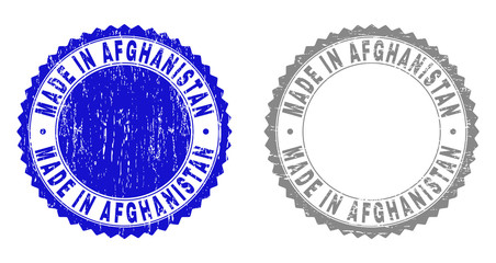 Grunge MADE IN AFGHANISTAN stamp seals isolated on a white background. Rosette seals with grunge texture in blue and grey colors.
