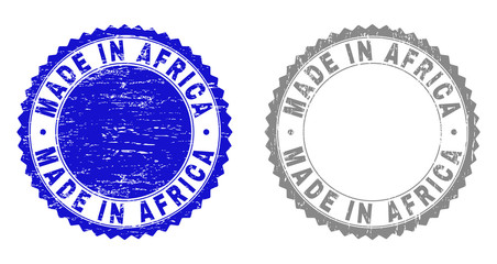 Grunge MADE IN AFRICA stamp seals isolated on a white background. Rosette seals with grunge texture in blue and grey colors. Vector rubber watermark of MADE IN AFRICA caption inside round rosette.