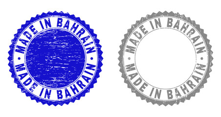 Grunge MADE IN BAHRAIN stamp seals isolated on a white background. Rosette seals with grunge texture in blue and gray colors. Vector rubber overlay of MADE IN BAHRAIN text inside round rosette.