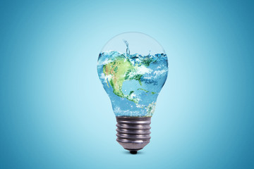 Light bulb with world globe and water