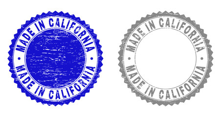Grunge MADE IN CALIFORNIA stamps isolated on a white background. Rosette seals with grunge texture in blue and gray colors.