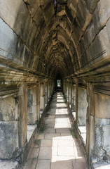 Fototapeta na wymiar Stone passageway at the Baphuon temple inside the Angkor temple complex in Cambodia