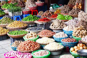 tropical spices and fruits sold at a local market in Hanoi (Vietnam)