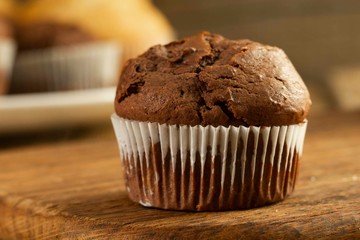 Chocolate cake and nut cake, homemade cakes on wooden background