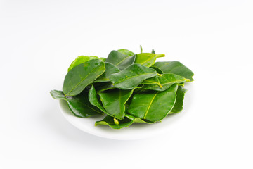 Kaffir lime leaf (Daun limau purut) isolated on white background