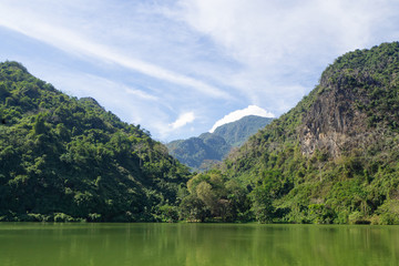 Naklejka na ściany i meble Scenic view landscape of lake and mountains in Northern Thailand.
