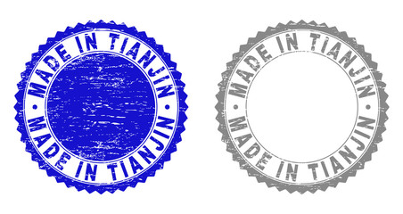 Grunge MADE IN TIANJIN stamp seals isolated on a white background. Rosette seals with grunge texture in blue and gray colors.