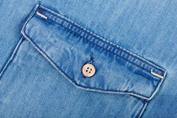 Denim jeans texture background with torn. The texture of the colored cotton fabric. Stitched...