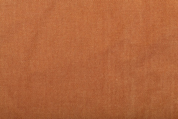 Fototapeta premium Denim jeans texture background with torn. The texture of the colored cotton fabric. Stitched texture jeans background. Fashion jeans button. Pocket and rivet on jeans. Fiber and fabric structure.