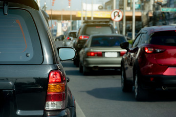 Cars on the road heading towards the goal of the trip, tourism by car, Break in traffic junction.