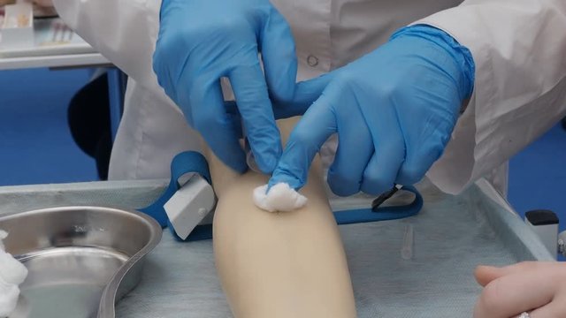 training injection into a vein on a mannequin