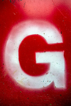Written Wording in Distressed State Typography Found Letter G