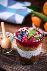 Raspberry and chia dessert layered in jar