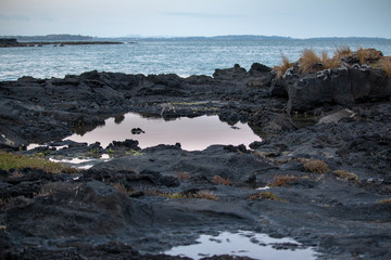 rocky volcanic seascape