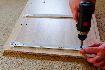 furniture assembly by screwdriver