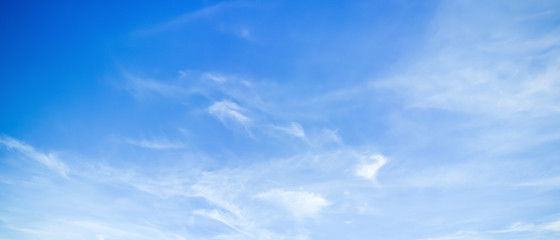 Clouds on a blue sky as background