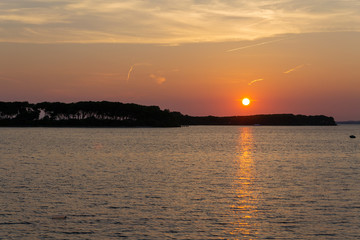 Naklejka premium The sunset in Porto Cesario, Puglia, Italy