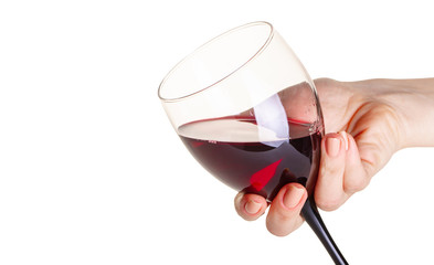 glass of red wine  in female hand