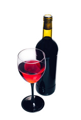 bottle and glass of red wine