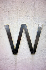 Written Wording in Distressed State Typography Found Letter W