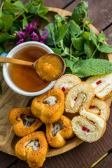 Mint grass herb tea jam jam apricot spoon wooden dessert tea drinking useful traditional cup blue